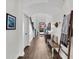 Inviting foyer with wood floors, bench seating, and arched doorway providing a warm entrance at 1391 Crane Creek Dr, Mount Pleasant, SC 29466