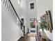 Elegant foyer with soaring ceilings, dark wood floors, and staircase, creating a grand entrance at 1391 Crane Creek Dr, Mount Pleasant, SC 29466