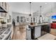 Open concept kitchen with stainless steel appliances, granite counters and center island at 1391 Crane Creek Dr, Mount Pleasant, SC 29466