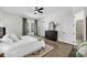 Tranquil main bedroom with hardwood floors, a ceiling fan, and neutral decor at 1391 Crane Creek Dr, Mount Pleasant, SC 29466