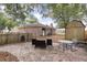 Large patio with outdoor seating, complemented by a well-maintained backyard and lush landscaping, perfect for relaxing at 1404 Ivy Isle Dr, Charleston, SC 29412