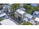 This is an aerial view of a modern Charleston home with balconies, city street access, and contemporary architectural accents at 15 Corinne St # B, Charleston, SC 29403