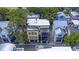 Aerial perspective displaying homes, including a rooftop deck with a shaded area at 15 Corinne St # B, Charleston, SC 29403