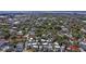 An aerial view of a Charleston neighborhood reveals a dynamic architectural landscape with a mix of old and new, lush greenery, and waterway at 15 Corinne St # B, Charleston, SC 29403