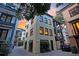 Rear exterior view reveals a private driveway and a lush green garden at 15 Corinne St # B, Charleston, SC 29403