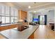 Open kitchen featuring stainless appliances, stone countertops, and easy access to the living room at 15 Corinne St # B, Charleston, SC 29403