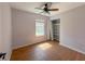 This bedroom features wood-look flooring, a closet, and a ceiling fan at 154 Tabby Creek Cir, Summerville, SC 29486