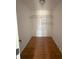 Spacious closet with wire rack shelving and wood-look flooring at 154 Tabby Creek Cir, Summerville, SC 29486