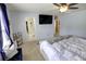 This bedroom features a television, ceiling fan, and walk-in closet at 1540 Dawn Mist Way, Charleston, SC 29414