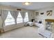 A comfortable bonus room with a white couch and movie theatre decor at 1540 Dawn Mist Way, Charleston, SC 29414