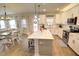 Bright kitchen with modern appliances and a central island with bar stool seating at 1540 Dawn Mist Way, Charleston, SC 29414