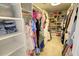 Spacious walk-in closet with custom shelving for clothing and shoes at 1540 Dawn Mist Way, Charleston, SC 29414