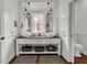 Elegant bathroom with double vanity, vessel sinks, and ample storage at 1702 Palmetto Blvd, Edisto Island, SC 29438
