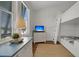 Bright room with a bunk bed, blue dresser and a TV at 1702 Palmetto Blvd, Edisto Island, SC 29438