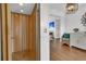 Interior home featuring an elevator, hard wood floors, and a fireplace at 1702 Palmetto Blvd, Edisto Island, SC 29438