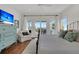 Relaxing main bedroom boasts balcony access and ocean views at 1702 Palmetto Blvd, Edisto Island, SC 29438