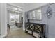 Welcoming foyer with tasteful decor, including a console table, mirror, and an open view into a bright office space at 181 Ashworth Dr, Summerville, SC 29486