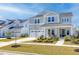 Charming home with a well-manicured lawn, inviting front porch, and a two-car garage at 181 Ashworth Dr, Summerville, SC 29486