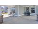Covered front porch with seating, creating a welcoming entrance to the home at 181 Ashworth Dr, Summerville, SC 29486