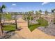 Well-maintained playground with rope bridge and natural wood mulch, creating a fun outdoor space at 181 Ashworth Dr, Summerville, SC 29486