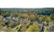 An aerial perspective showcases houses with yards, bordered by trees and a serene marshy area at 1844 Hubbell Dr, Mount Pleasant, SC 29466