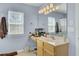 Bathroom featuring vanity, light fixtures, mirror and window with natural light at 1844 Hubbell Dr, Mount Pleasant, SC 29466