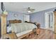 Comfortable bedroom features wood floors, ceiling fan, and ensuite bathroom at 1844 Hubbell Dr, Mount Pleasant, SC 29466