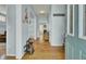 View of the entryway with light blue walls and hardwood floors at 1844 Hubbell Dr, Mount Pleasant, SC 29466