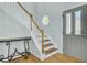 Foyer shows wood stairs, front door with decorative window, and accent table, welcoming guests at 1844 Hubbell Dr, Mount Pleasant, SC 29466