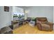Living room with hardwood floors, a TV, and a brown recliner at 1844 Hubbell Dr, Mount Pleasant, SC 29466