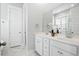 Elegant bathroom featuring double sinks, marble countertop, and modern fixtures at 190 Steepbrook, Summerville, SC 29486