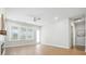 Large living room with hardwood floors, modern fireplace, and a ceiling fan offering comfort and style at 190 Steepbrook, Summerville, SC 29486