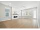 Bright living room with a modern fireplace, hardwood floors, and lots of natural light, great for relaxing at 190 Steepbrook, Summerville, SC 29486
