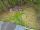 Aerial view of backyard featuring a detached workshop, chicken coop and playhouse at 202 Woodland Dr, Summerville, SC 29485