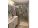 Contemporary bathroom with marble walk-in shower and dual-sink vanity for a spa-like experience at 202 Woodland Dr, Summerville, SC 29485