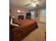 Bedroom featuring a ceiling fan, a comfortable bed, and windows with plantation shutters at 202 Woodland Dr, Summerville, SC 29485