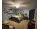 Bedroom with blue walls, ceiling fan, and a comfortable bed at 202 Woodland Dr, Summerville, SC 29485