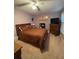 Bedroom featuring a ceiling fan, a comfortable bed, and windows with plantation shutters at 202 Woodland Dr, Summerville, SC 29485