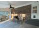 Outdoor living space featuring a grill, dining area, and ample seating at 202 Woodland Dr, Summerville, SC 29485
