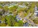 Overhead aerial view of homes in a neighborhood with mature trees at 205 Fairchild St, Daniel Island, SC 29492