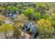 Aerial view of two-story homes among blooming trees at 205 Fairchild St, Daniel Island, SC 29492