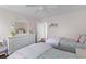 Bedroom featuring two beds, a ceiling fan, and a dresser with a mirror at 205 Fairchild St, Daniel Island, SC 29492