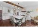 Well-lit kitchen features stainless steel appliances, a center island with seating, and modern finishes at 205 Fairchild St, Daniel Island, SC 29492