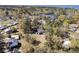 Wonderful treetop view of a cute house nestled among trees near a blue lake at 212 Lake Moultrie Dr, Bonneau, SC 29431