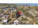 An excellent bird's-eye view of a house tucked away among trees near a blue lake at 212 Lake Moultrie Dr, Bonneau, SC 29431