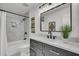 Updated bathroom with tub-shower and granite countertops at 212 Lake Moultrie Dr, Bonneau, SC 29431