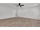 Large bonus room with stairwell access and laminate wood-look floors at 212 Lake Moultrie Dr, Bonneau, SC 29431