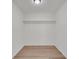 Walk-in closet with wood floor and shelf at 212 Lake Moultrie Dr, Bonneau, SC 29431