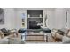 Cozy living room features a brick fireplace, modern decor, and large windows for natural light at 212 Lake Moultrie Dr, Bonneau, SC 29431