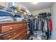 Organized walk-in closet featuring shelving, hanging rods, dresser, and storage space at 219 Tuscany Ct, Ladson, SC 29456